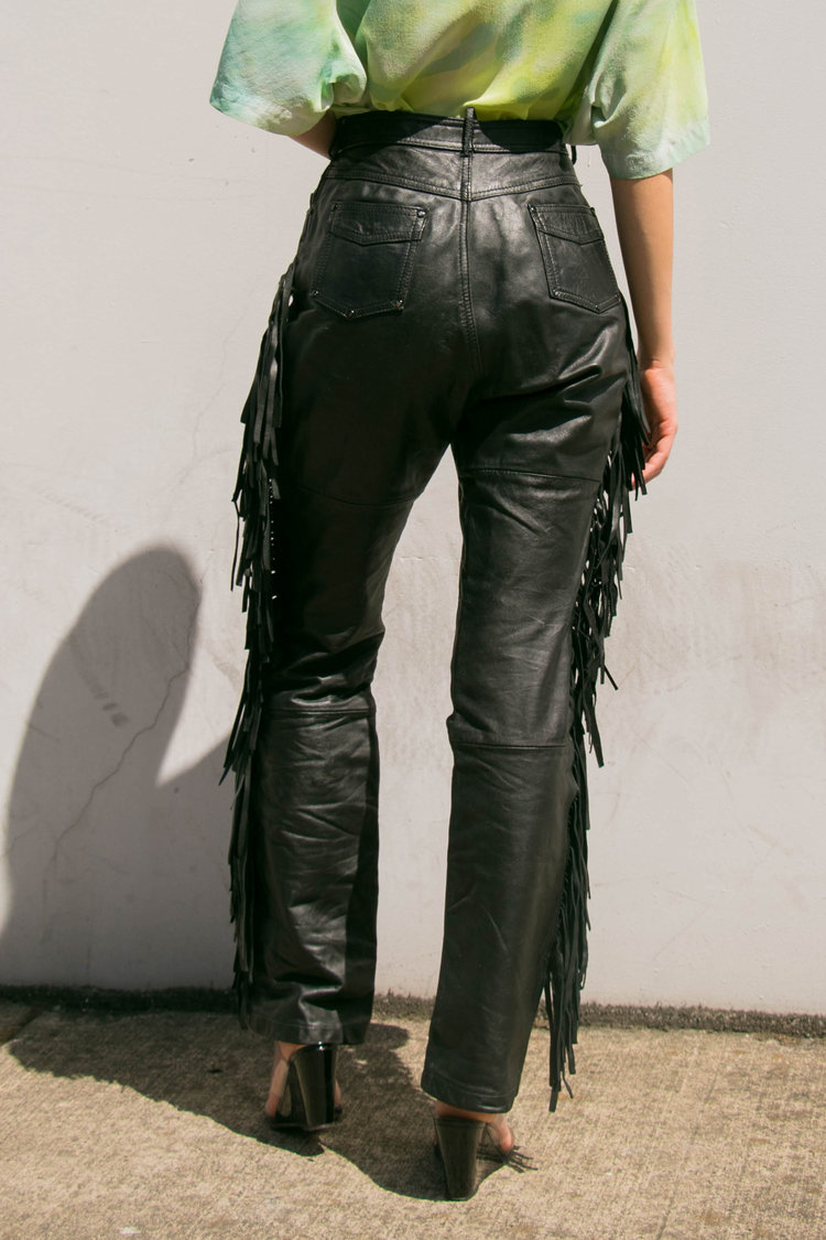 black pants with fringe on the side